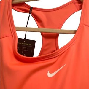 XL Cute Nike sports bra. It’s a pretty soft orange with medium support.